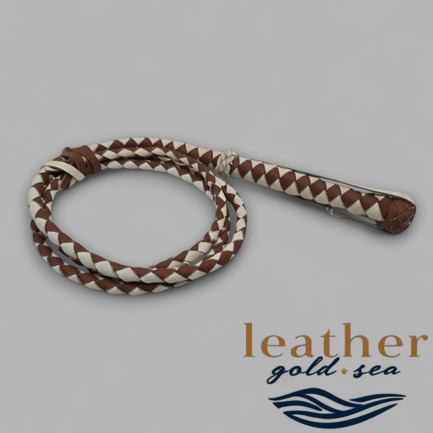 brown leather whip